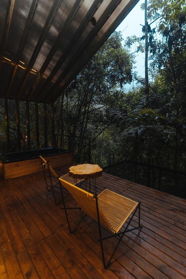 Отель Oculto Refugio De Bosque Энвигадо Экстерьер фото